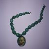 collier en argile chaque perle fait main le pendentif répresente le peintre Vincent Van Gogh